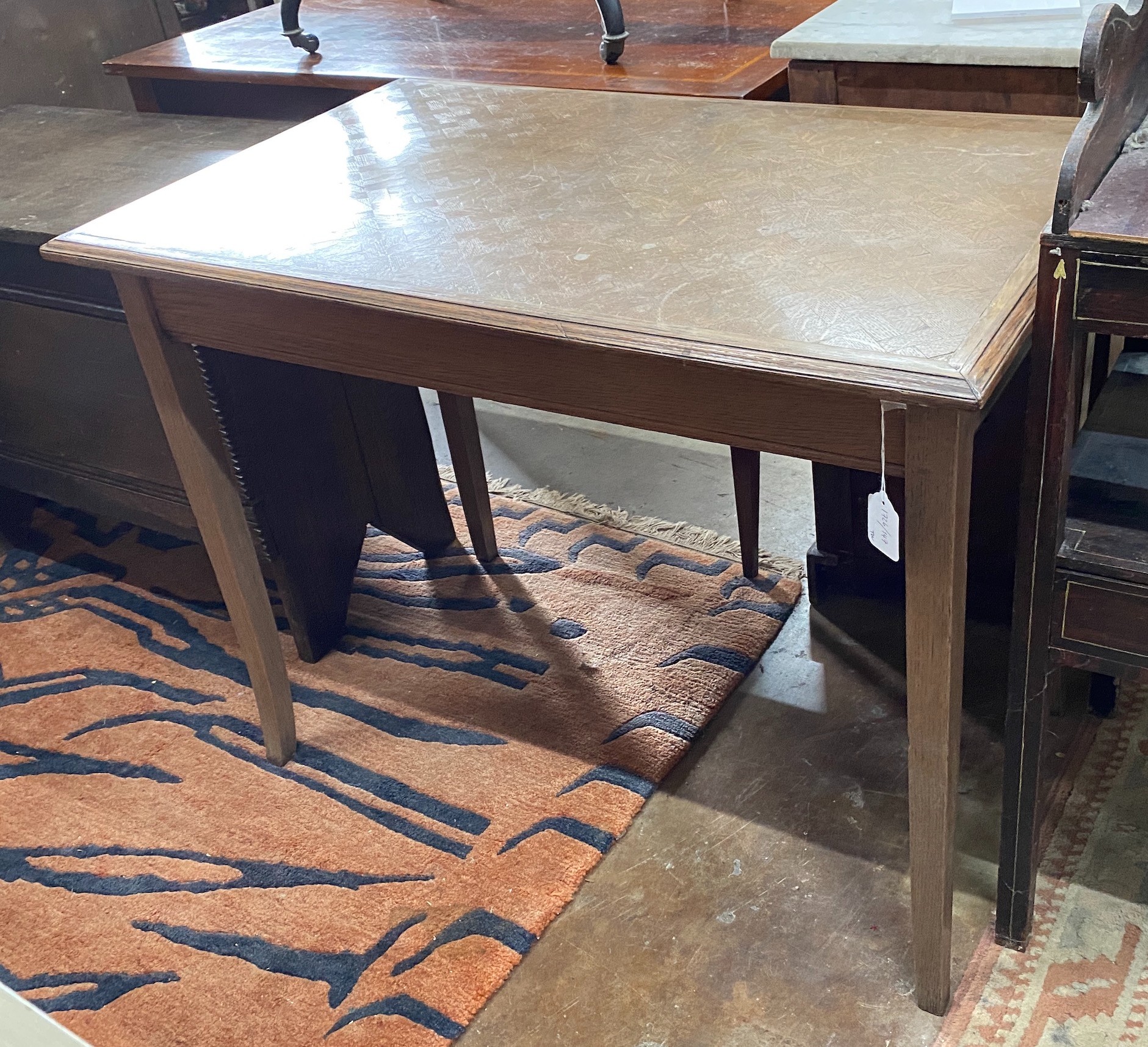 An early 20th century rectangular oak parquetry side table, width 92cm, depth 57cm, height 71cm together with a French caned side chair